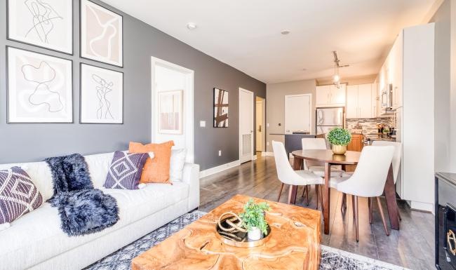 a living room with a couch and a table