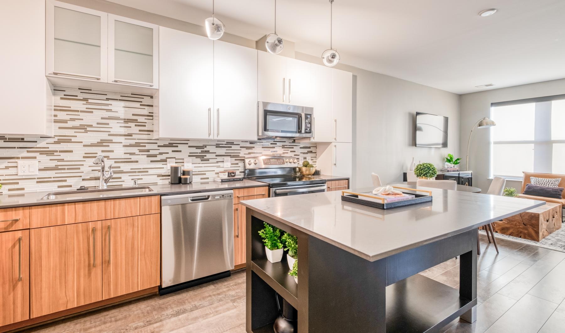 a kitchen with white cabinets