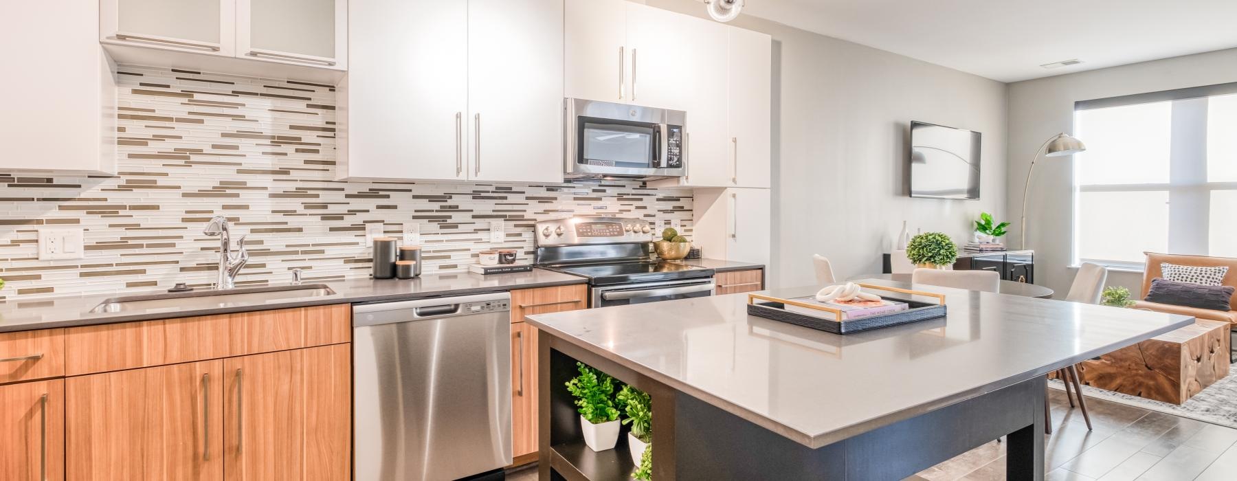 a kitchen with white cabinets